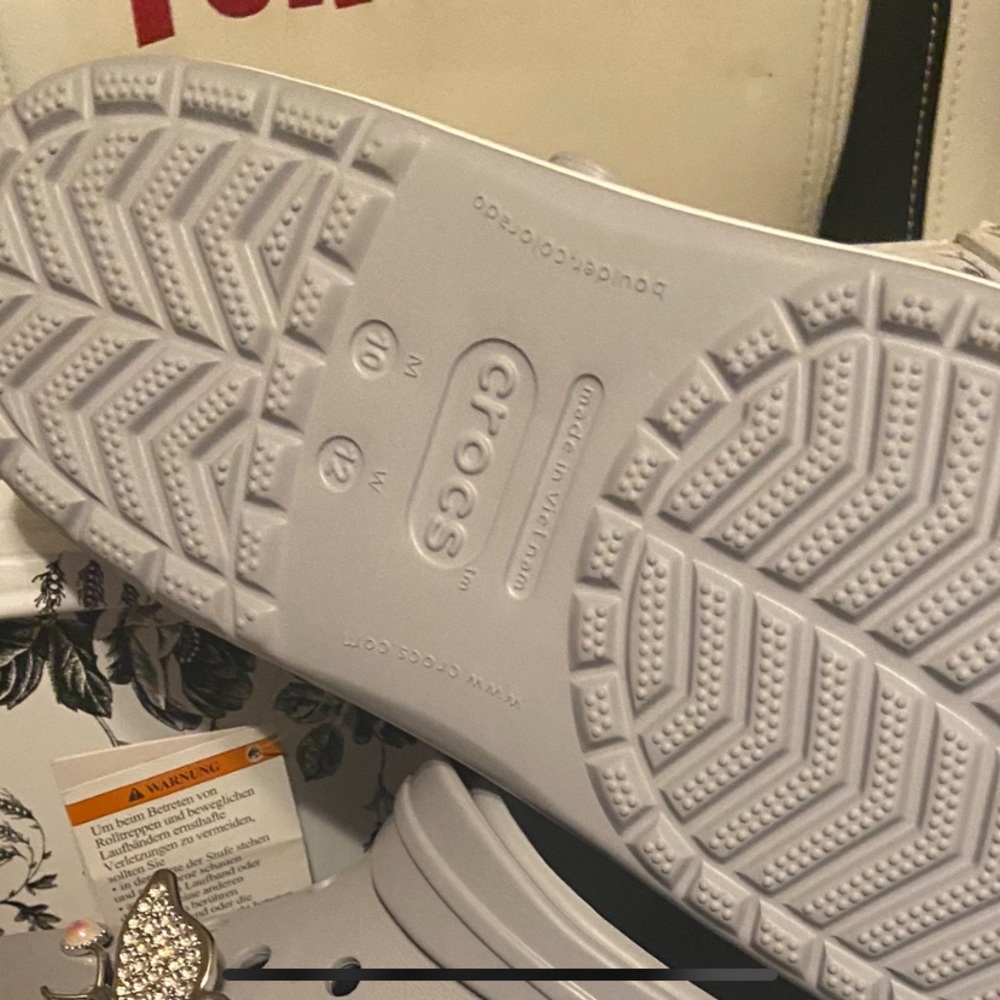 Gray crocs original they are gray white with a little bit of purple new with tag